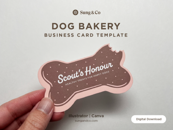 A hand holding a pink and brown dog bone-shaped business card mockup with customizable text on the front. The card has a playful bite-mark detail at the top and is being promoted as a dog bakery business card template with options to download via Illustrator or Canva.